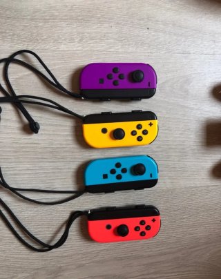 Nintendo Switch Azul/Rojo + Juegos+Mandos extra