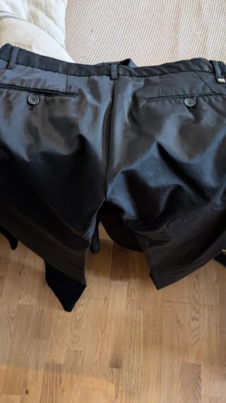 Traje negro brillante