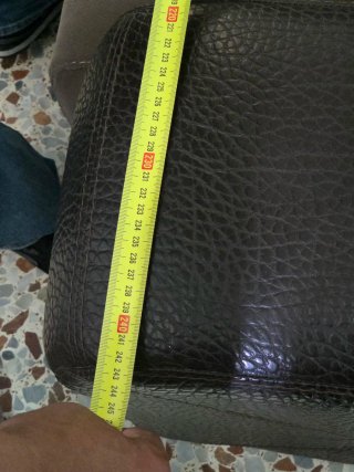 Sofá marrón extensible tela y piel, con porte.