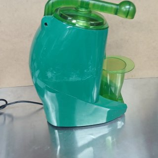 Exprimidor industrial verde