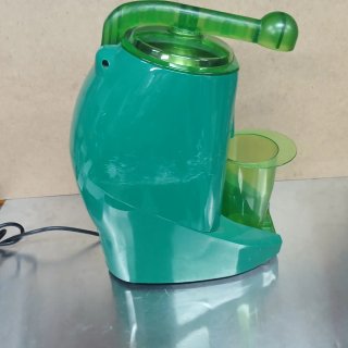 Exprimidor industrial verde