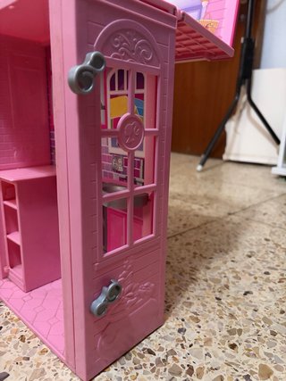 Casita de muñecas transportable
