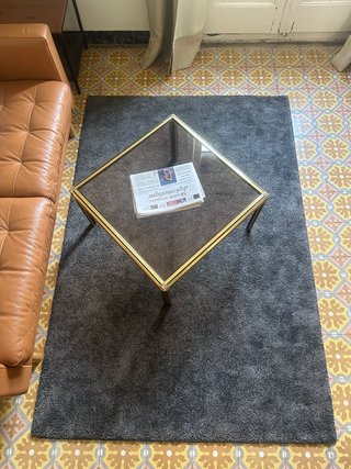 Alfombra gris cuadrada de tela