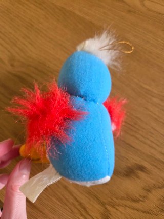 Peluche pájaro azul y amarillo