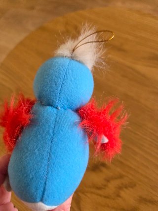 Peluche pájaro azul y amarillo