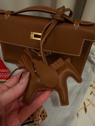 Bolso Hermés Kelly Pochette Swift dorado-marron