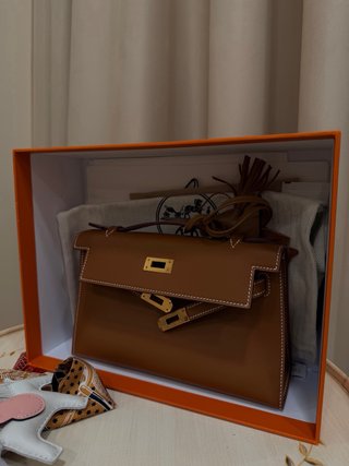 Bolso Hermés Kelly Pochette Swift dorado-marron