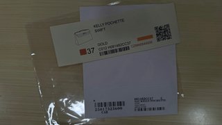 Bolso Hermés Kelly Pochette Swift dorado-marron