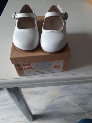 Scarpette bianche in vitello con suola in cuoio