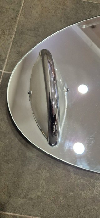 Espejo de baño ovalado con repisa e iluminacion