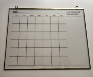 Pizarra de cristal para notas y calendario