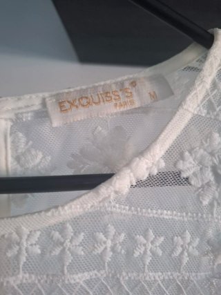 Blusa blanca encaje pompones