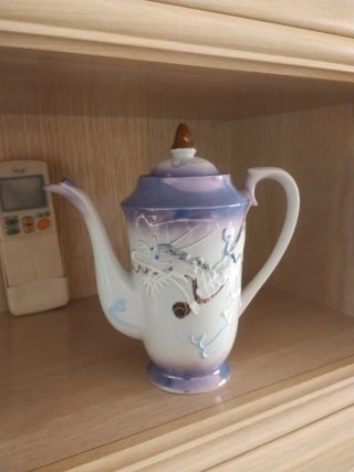 Juego de té de porcelana morado y blanco