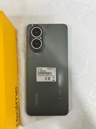 Realme C67 Caja y Teléfono