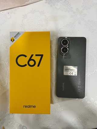 Realme C67 Caja y Teléfono