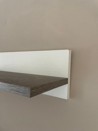 Muebles salón y TV madera y blanco