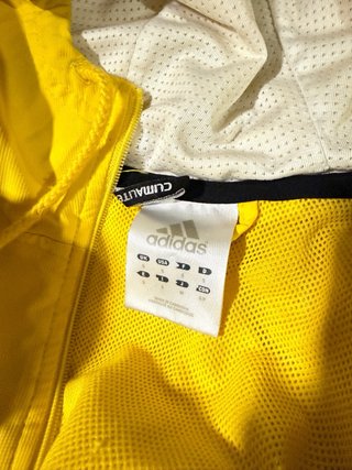 Chaqueta deportiva Adidas amarilla y negra