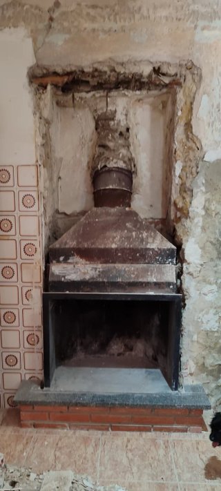 Chimenea de leña de hierro