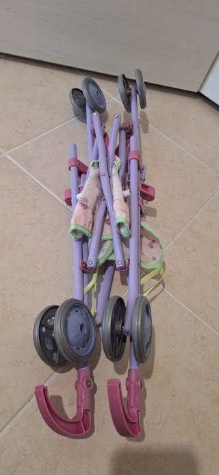 Passeggino giocattolo per bambole