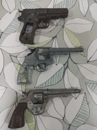 Pistolas de juguete de metal