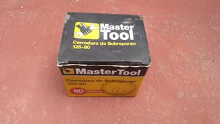 Cerradura sobreponer Master Tool 125-80 Dorada