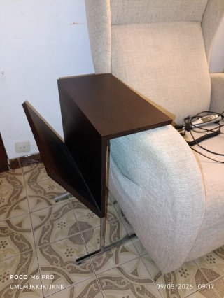 Butaca de tela beige  con mando y motor