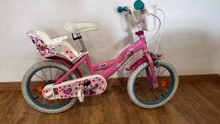 Bicicleta niña Minnie rosa con porta bebes y cesta