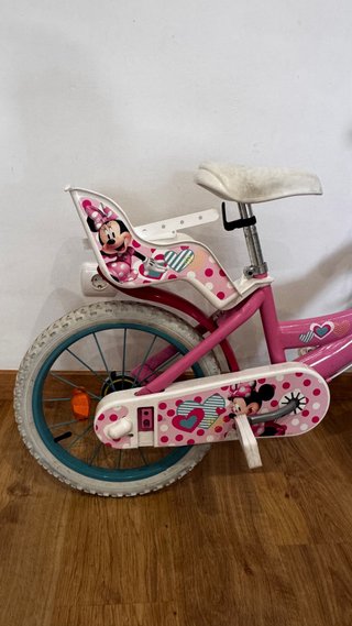 Bicicleta niña Minnie rosa con porta bebes y cesta