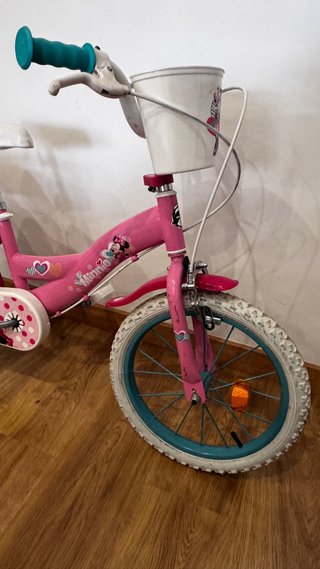 Bicicleta niña Minnie rosa con porta bebes y cesta