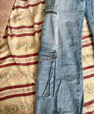 Jeans morbidi con tasche