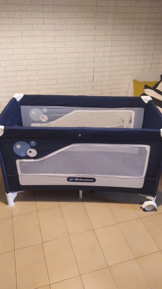 Cuna de viaje azul