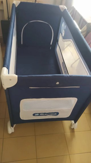 Cuna de viaje azul