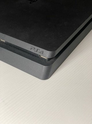 PlayStation 4 Slim 500GB + 4 Juegos