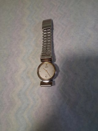 Reloj Sanyo Cuarzo Dorado y Plateado.