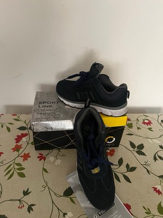 Zapatos de seguridad azul y gris