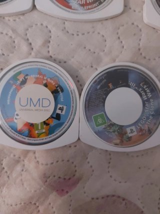 PSP Slim 2004 Negra + Cargador + 10 Juegos