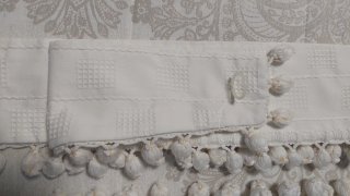 Cortinas beige con pompones