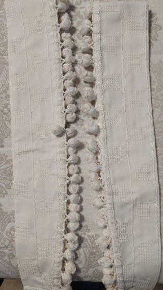 Cortinas beige con pompones
