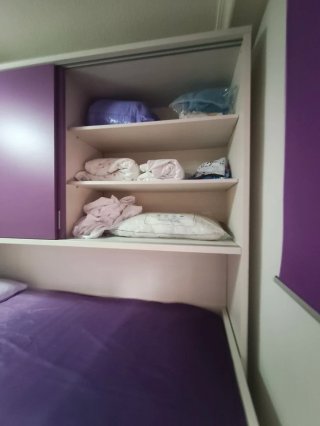 Cama nido con armario y cajones