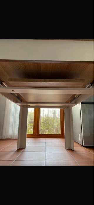 Mesa de comedor de madera extensible