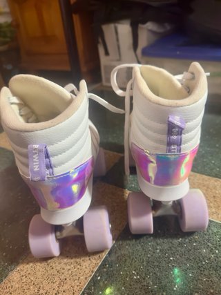 Patines blancos cuatro ruedas