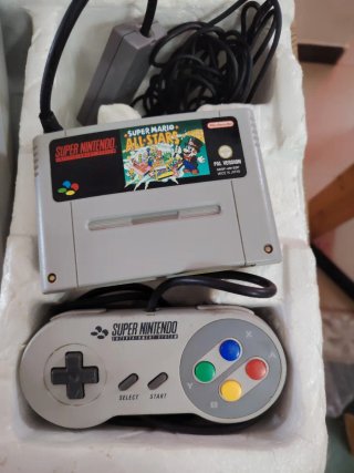 Super Nintendo Entertainment System con Super Mari