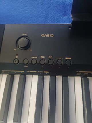 Teclado electrónico con soporte