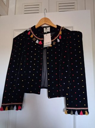Chaqueta Coosy negra con topos multicolor