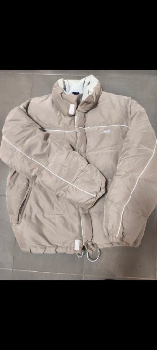 Cazadora de plumas beige