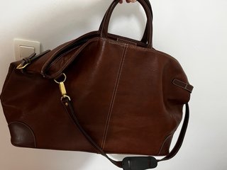 Bolso y neceser de cuero marrón