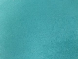Sofá de terciopelo verde esmeralda