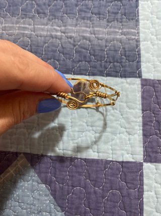 Braccialetto con pietra viola e oro