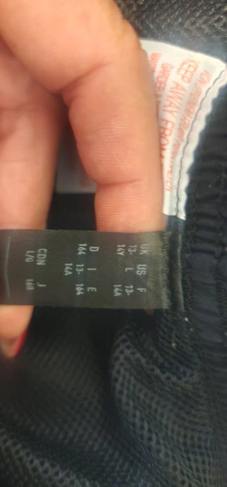 Pantalones cortos Adidas niño negro y Under Armour