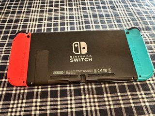 Nintendo Switch Azul y Naranja + Joy-Con Gris free